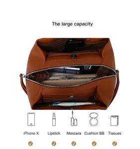 Detailed view showing the large interior capacity of the brown retro tote bag.