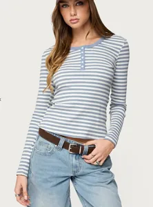 Detailed view of women's blue and white striped long-sleeve Henley neck T-shirt