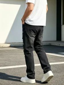 Men's high street straight leg jeans featuring side embroidery and distressed back view