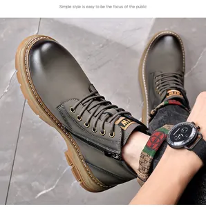Detailed view of high-top men's leather boots with side zipper and laces.