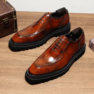Premium brown leather Oxford shoes for men featuring thick lug soles and brogue details.