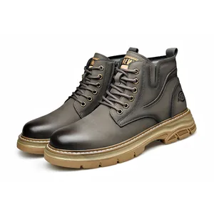 Side view detail of grey leather men's Martin boots featuring a durable non-slip lug sole.