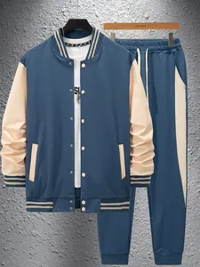 Detailed view of men's blue and beige varsity jacket and matching jogger set