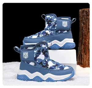 Blue camouflage kids' snow boots with thickened plush lining and water-repellent fabric.