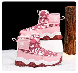 Stylish pink camo kids winter snow boots with wave-shaped thick anti-slip soles for outdoor