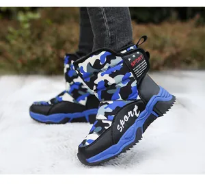 Detail view of durable kids camouflage snow boots with warm lining and non-slip sole