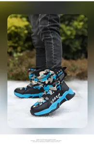 Close-up of children's blue camouflage snow boots for outdoor winter warmth.