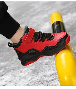 Warm winter fur-lined boys' basketball sneakers with stylish red and black leather design