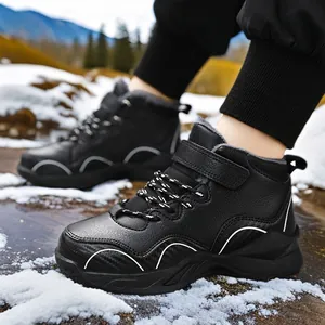 Water-resistant black boys winter boots with warm fleece lining for outdoor snow sports