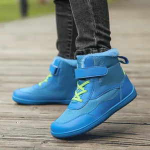 Blue children's waterproof snow boots with warm faux fur lining and green laces