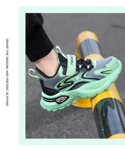 Close-up of mint green boy's anti-slip sports sneakers with velcro strap