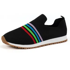Breathable black fly-knit slip-on sneakers for women with stylish rainbow stripe details