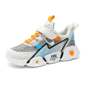 Breathable white and grey children's running sneakers with vibrant orange and blue accents