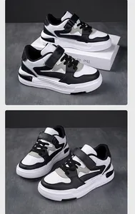 Vista detallada de zapatillas de cuero para niños en blanco y negro con cierre de velcro