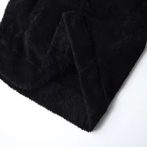 Cozy black men's faux lamb wool jacket featuring warm double-sided fleece texture details