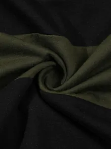 Close-up macro shot of high-quality knitted fabric on men's striped casual polo shirt