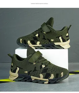 Detailed side view of green camo mesh sneakers for boys with rugged slip-resistant sole.