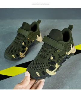 Detail of breathable mesh camouflage running shoes for boys with Velcro strap