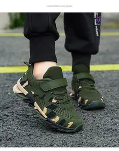 Close-up view of boys' breathable camouflage mesh sneakers featuring green knit upper