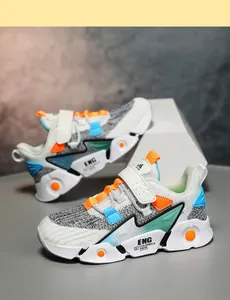 Side view of breathable mesh boys' sports shoes with colorful accents