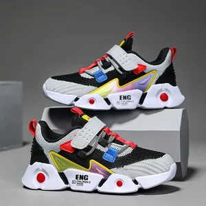 Breathable mesh children's sports shoes for boys with chunky white soles and red accents