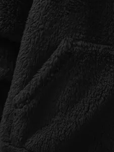 Close-up detail showing the soft black coral fleece texture of the men's hoodie