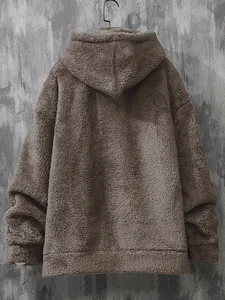 Detailed back view of a cozy brown men's sherpa fleece hoodie with warm texture