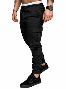 Detail of black men's cargo joggers showing the side flap pocket and elastic cuffs