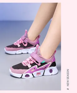 Close-up detail of girls' pink and black mesh breathable hollow summer sneakers