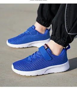 Detailed view of breathable blue mesh running shoes for boys with lightweight soft sole.