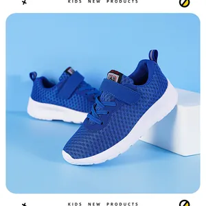Detailed view of blue breathable mesh children's sports shoes with white soft sole