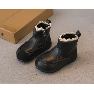 Black girls' leather boots with delicate white lace trim and side zipper detail