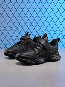 All-black children's athletic running shoes with velcro straps and soft sole