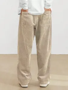 Rear view detail of men's vintage khaki corduroy straight-leg casual trousers