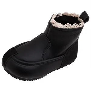 Classic girls' black leather boots featuring delicate lace trim and non-slip rubber sole