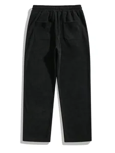 Detailed back view of black men's corduroy casual pants featuring elastic waist and pockets