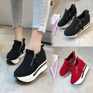 Stylish women's platform canvas sneakers featuring a side zipper and wedge heel design
