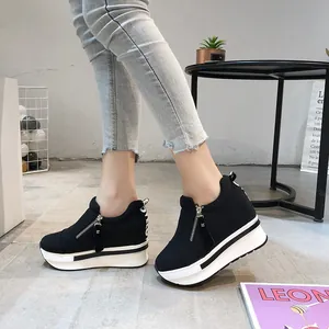 Stylish black platform canvas shoes for women featuring a side zipper and thick white sole