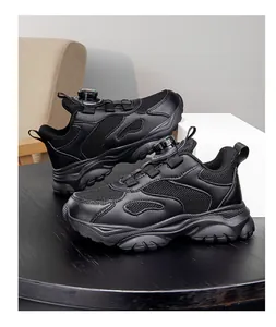 Scarpe da corsa nere in mesh traspirante per ragazzi con chiusura a rotella meccanica.