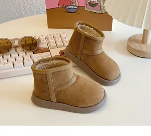 Cozy tan fleece-lined kids snow boots with durable non-slip rubber soles for winter