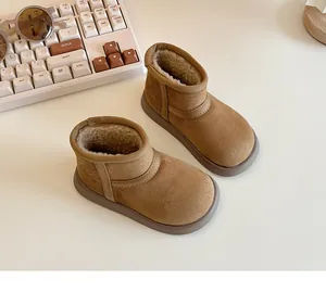 Close-up of children's warm snow boots with thick plush lining and anti-slip sole