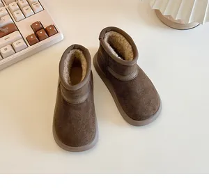 Close-up of children's winter snow boots with thick faux fur lining for extra warmth