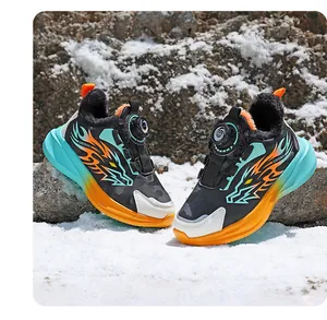 Detailed view of children's fleece-lined winter sneakers in an outdoor snowy mountain scene