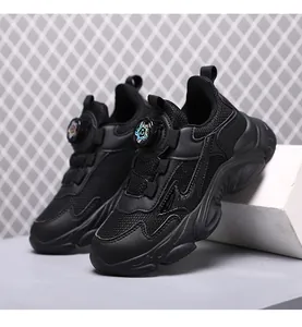 Black breathable boys athletic sneakers with rotary buckle closure and chunky dad sole