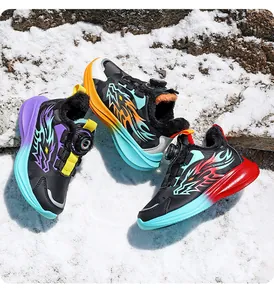 Vibrant kids winter sneakers with warm plush lining and dragon pattern on snow background