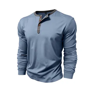 Detail view of men's cotton long sleeve Henley t-shirt with grey contrast collar.