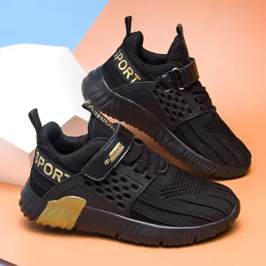 Breathable boys' mesh running sneakers with gold SPORT text and soft soles