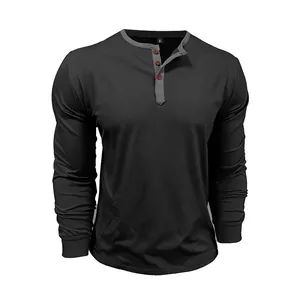 Macro view of the collar and button placket on a men's cotton long sleeve Henley