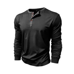 Detail view of men's black long-sleeve cotton Henley T-shirt with brown buttons