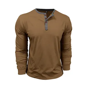 Close-up of brown men's cotton long sleeve shirt with grey contrast button collar